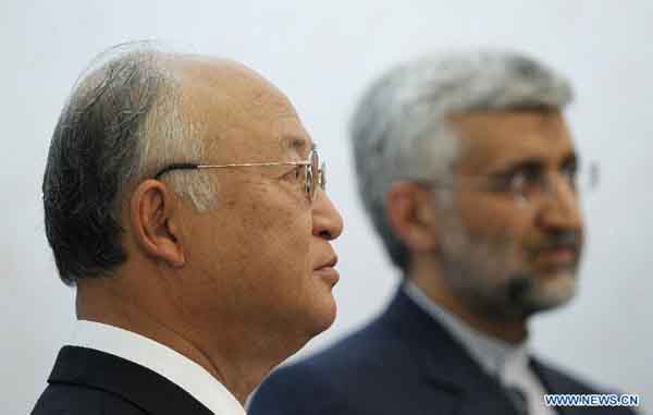 Director General of the International Atomic Energy Agency (IAEA) Yukiya Amano (L) and Iran's chief nuclear negotiator Saeed Jalili attend a joint press conference after a meeting in Tehran, capital of Iran, May 21, 2012. Amano arrived in Tehran Monday for crucial nuclear talks. [Adel Paziar/Xinhua]