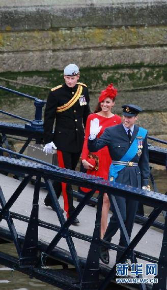 Britain's Catherine, Princes Harry (L) and William (R) onboard the Spirit of Chartwell during the Queen's Diamond Jubilee Pageant on the River Thames in London June 3, 2012. Britain's Queen Elizabeth joins an armada of 1,000 boats in a gilded royal barge on Sunday in a spectacular highlight of four days of nationwide celebrations to mark her 60th year on the throne. 